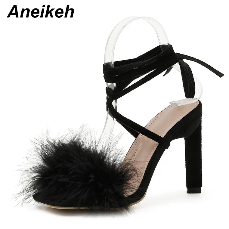 Discover the allure of Aneikeh Rome's fashion-forward furry cross-tied pumps. These women's sandals feature a seductive thin high heel and a lace-up design that exudes elegance and style.