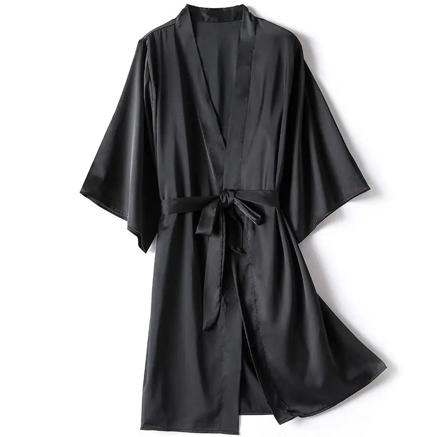 **"Satin Kimono Bathrobe Gown"**  
Embrace your sensual side with Tye Meshun’s satin kimono bathrobe. Silky, sleek, and irresistibly alluring, it drapes perfectly over your favorite lingerie, transforming every evening into