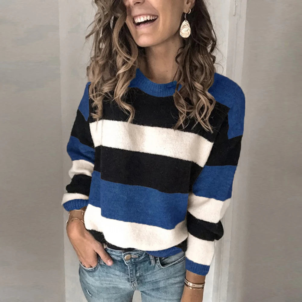 Discover the cozy Fall Casual Long Sleeve Pullover with a stylish O Neck and vibrant Color Block design. This loose knitted sweater is a must-have addition to any woman's wardrobe.