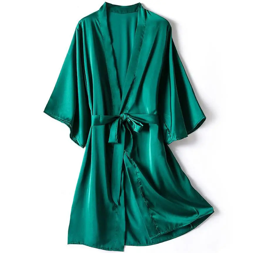 **"Satin Kimono Bathrobe Gown"**  
Embrace your sensual side with Tye Meshun’s satin kimono bathrobe. Silky, sleek, and irresistibly alluring, it drapes perfectly over your favorite lingerie, transforming every evening into