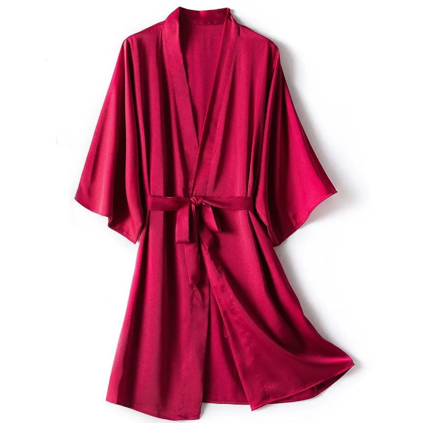 **"Satin Kimono Bathrobe Gown"**  
Embrace your sensual side with Tye Meshun’s satin kimono bathrobe. Silky, sleek, and irresistibly alluring, it drapes perfectly over your favorite lingerie, transforming every evening into