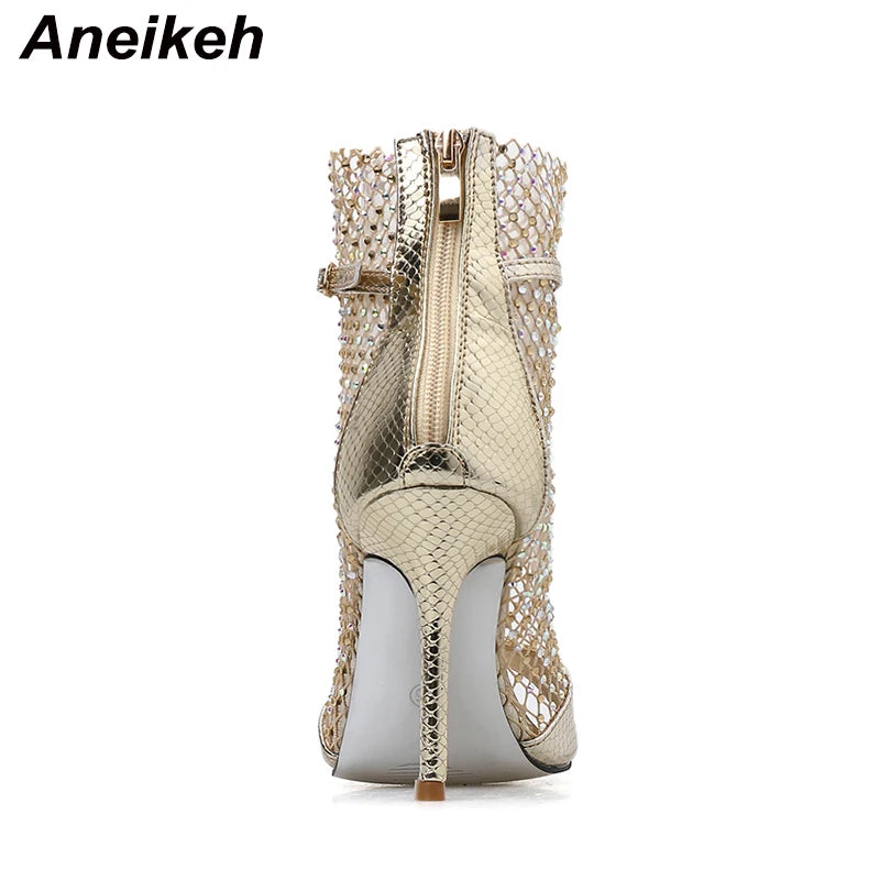 Discover the Aneikeh Glitter Gladiator Sandals: a stunning pair of high-heeled, peep-toe pumps that blend sexiness with comfort, thanks to their airy mesh design and sleek, thin heels.