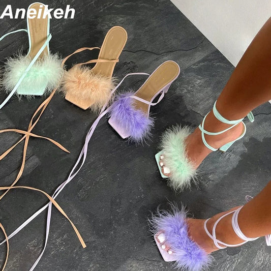 Discover the allure of Aneikeh Rome's fashion-forward furry cross-tied pumps. These women's sandals feature a seductive thin high heel and a lace-up design that exudes elegance and style.