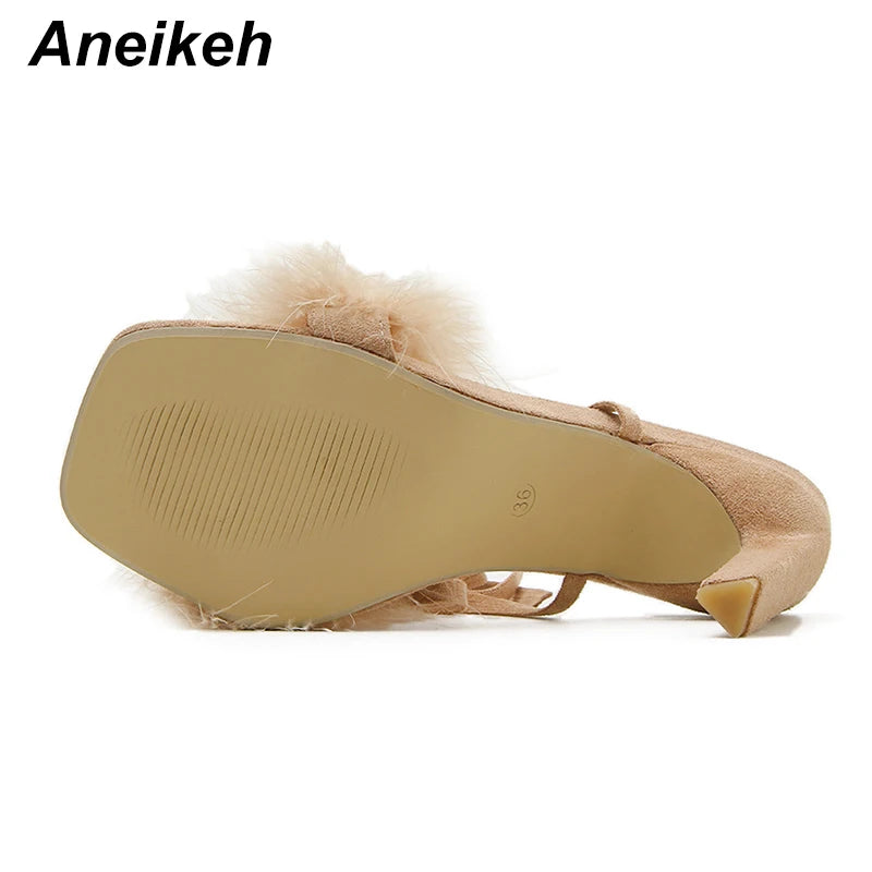 Discover the allure of Aneikeh Rome's fashion-forward furry cross-tied pumps. These women's sandals feature a seductive thin high heel and a lace-up design that exudes elegance and style.