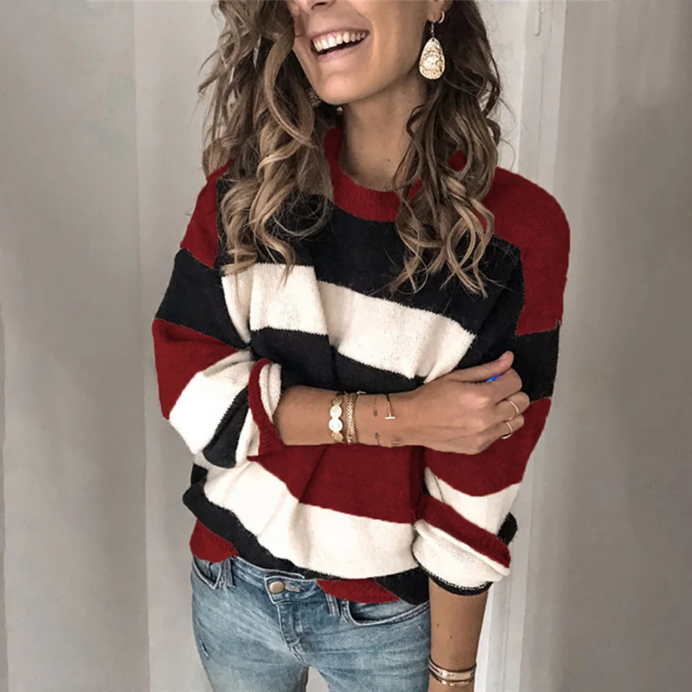 Discover the cozy Fall Casual Long Sleeve Pullover with a stylish O Neck and vibrant Color Block design. This loose knitted sweater is a must-have addition to any woman's wardrobe.