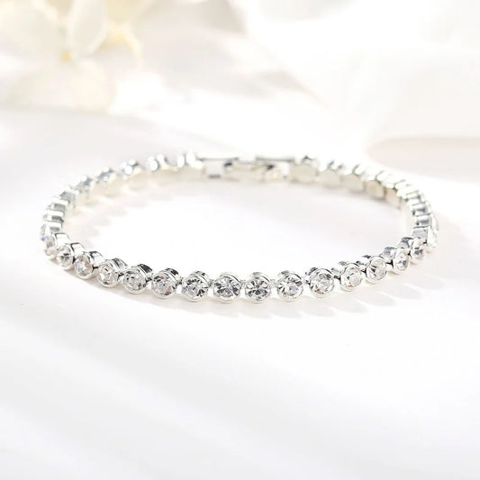 **"Alluring Crystal Tennis Bracelets"**  
Handpicked for Tye Meshun's Boutique, these Roman chain designs—available in silver—sparkle with timeless elegance. Perfect for birthdays or as a special gift!