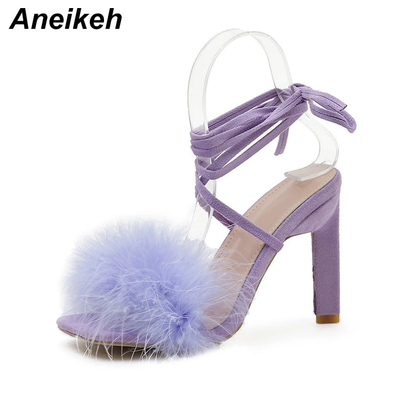 Discover the allure of Aneikeh Rome's fashion-forward furry cross-tied pumps. These women's sandals feature a seductive thin high heel and a lace-up design that exudes elegance and style.