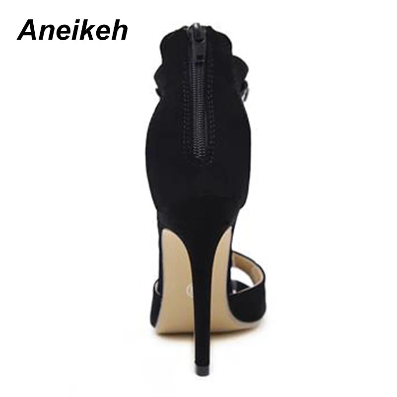 Discover the Aneikeh Black Crystal Sandals – a dazzling blend of luxury and allure. These women's high heels feature sumptuous suede leather, embellished with sparkling rhinestones. With a sexy peep toe and an elegant ankle