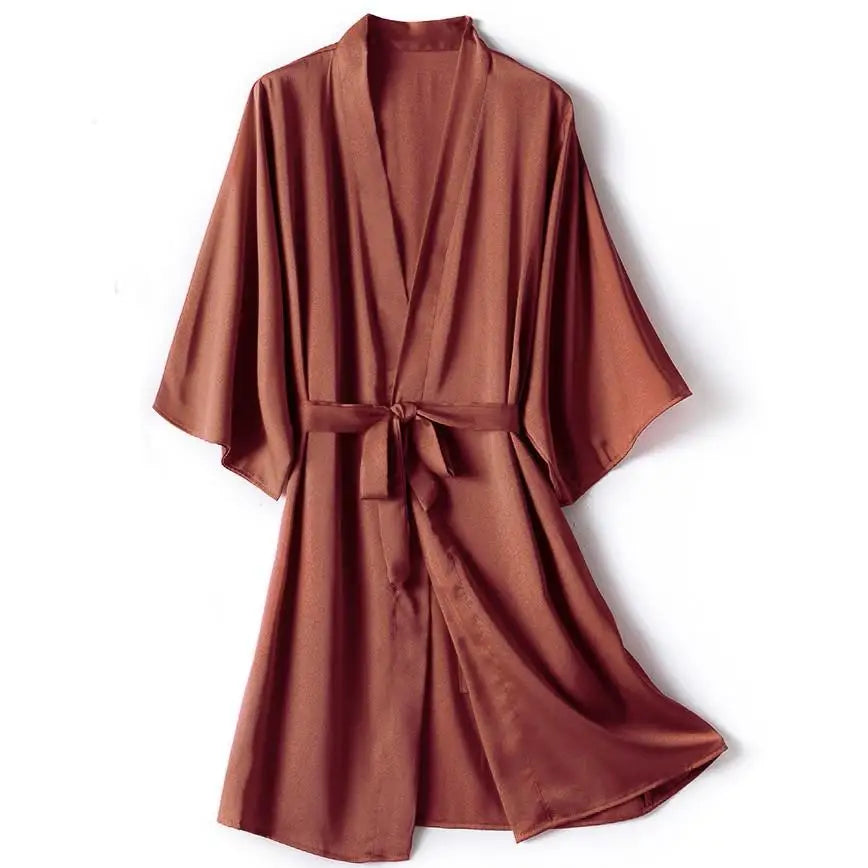 **"Satin Kimono Bathrobe Gown"**  
Embrace your sensual side with Tye Meshun’s satin kimono bathrobe. Silky, sleek, and irresistibly alluring, it drapes perfectly over your favorite lingerie, transforming every evening into