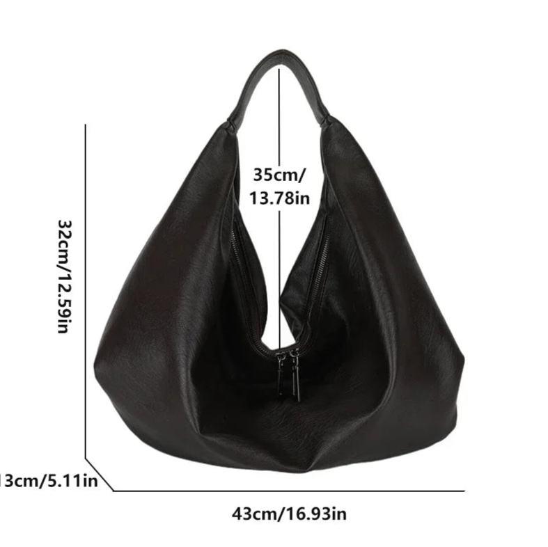 **"Bold Leather Shoulder Bag"**  
Add excitement to your everyday look with Tye Meshun's bold leather shoulder bag. Its roomy hobo design and luxurious craftsmanship make it as functional as it is stylish. Perfect for travel,