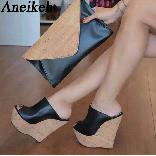 The Aneikeh Black Platform Wedge Sandals are a stylish choice featuring a peep toe design and a super high heel that adds a touch of sexiness to the mules style.