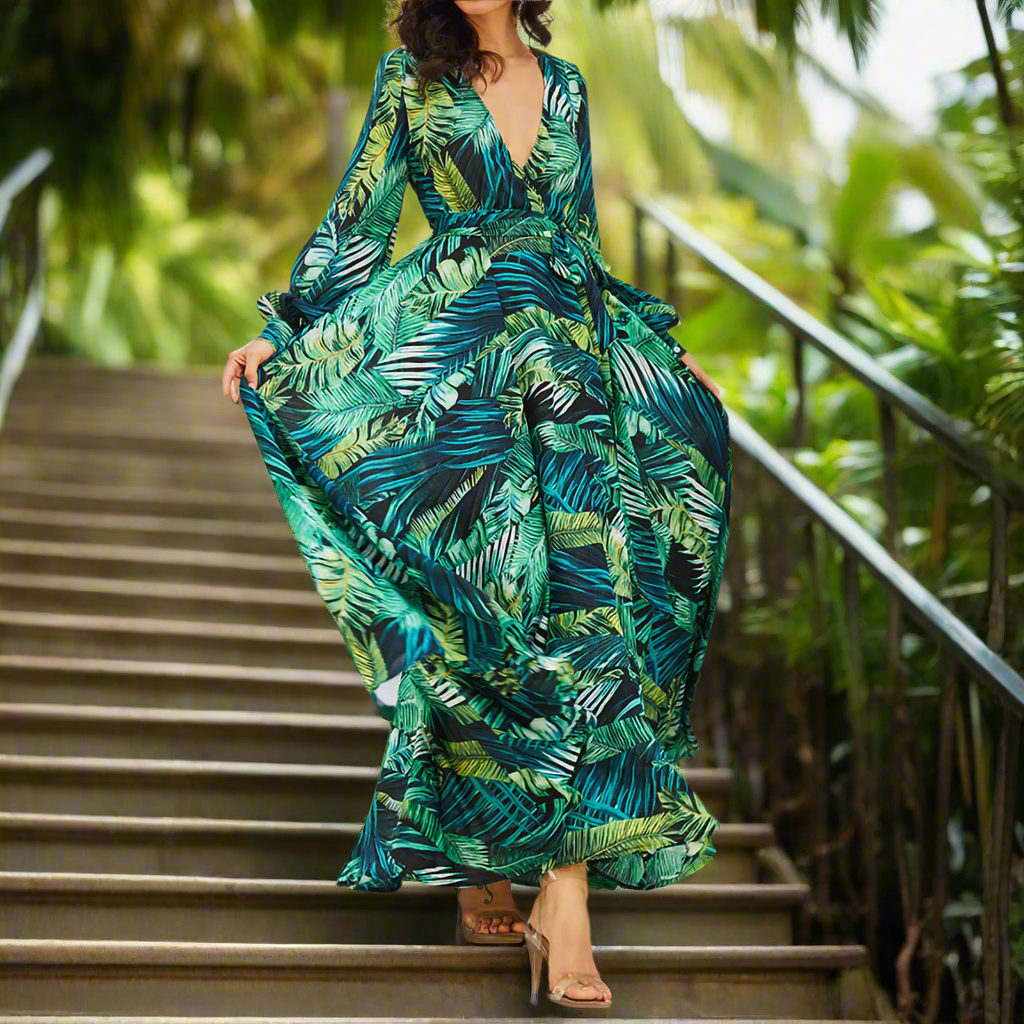 This boho green leaf print maxi dress has a V-neck and is backless. It's great for a special occasion, and the plunging neckline and backless design make it a bit daring.