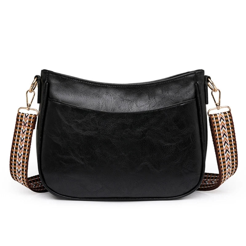 **"Large Capacity Crossbody Bag"**  
Handpicked for Tye Meshun's Boutique, this versatile PU leather bag features a spacious interior, wide strap, and stylish design. Perfect as a handbag or shoulder bag, it’s ideal for dai