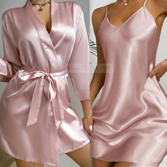 **"Satin Kimono Robe & Matching Gown"**  
Elevate your lounge game with Tye Meshun’s satin kimono robe and separate matching gown. The breezy robe drapes beautifully, while the form-fitting gown offers a flattering silhouet