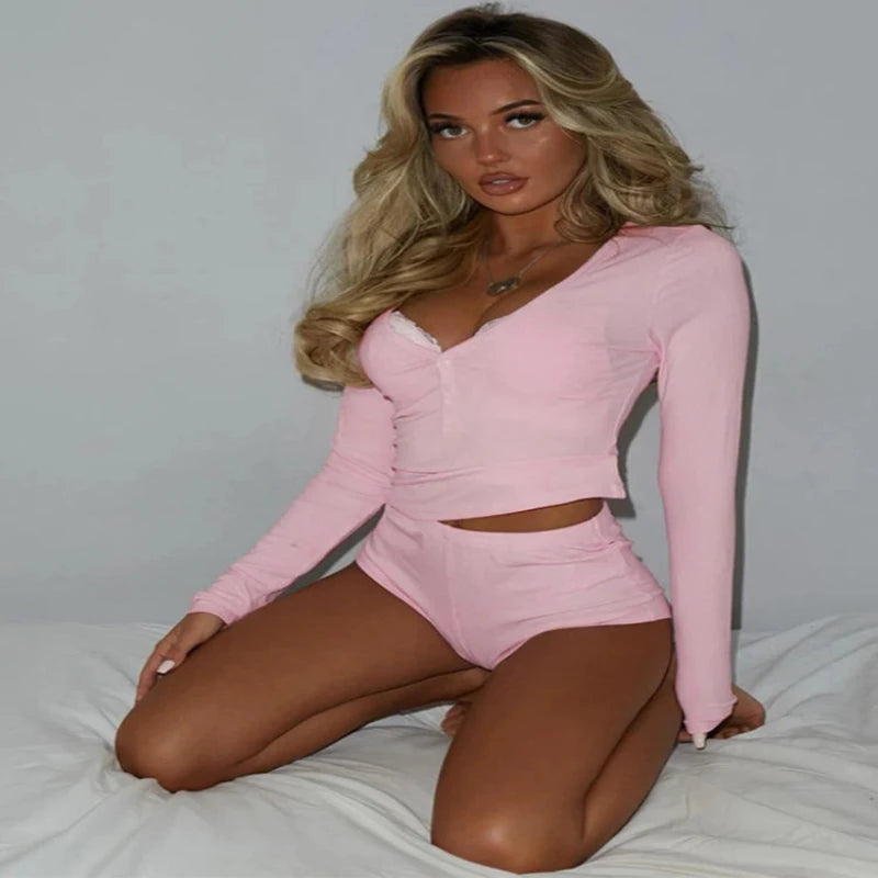 **"Women's Ribbed 2-Piece Set – Long Sleeve Top & Micro Shorts"**  
Own the night—or your day—with Tye Meshun's ribbed bodycon set. Featuring a sleek long-sleeve tee and figure-hugging micro shorts, this outfit blends c