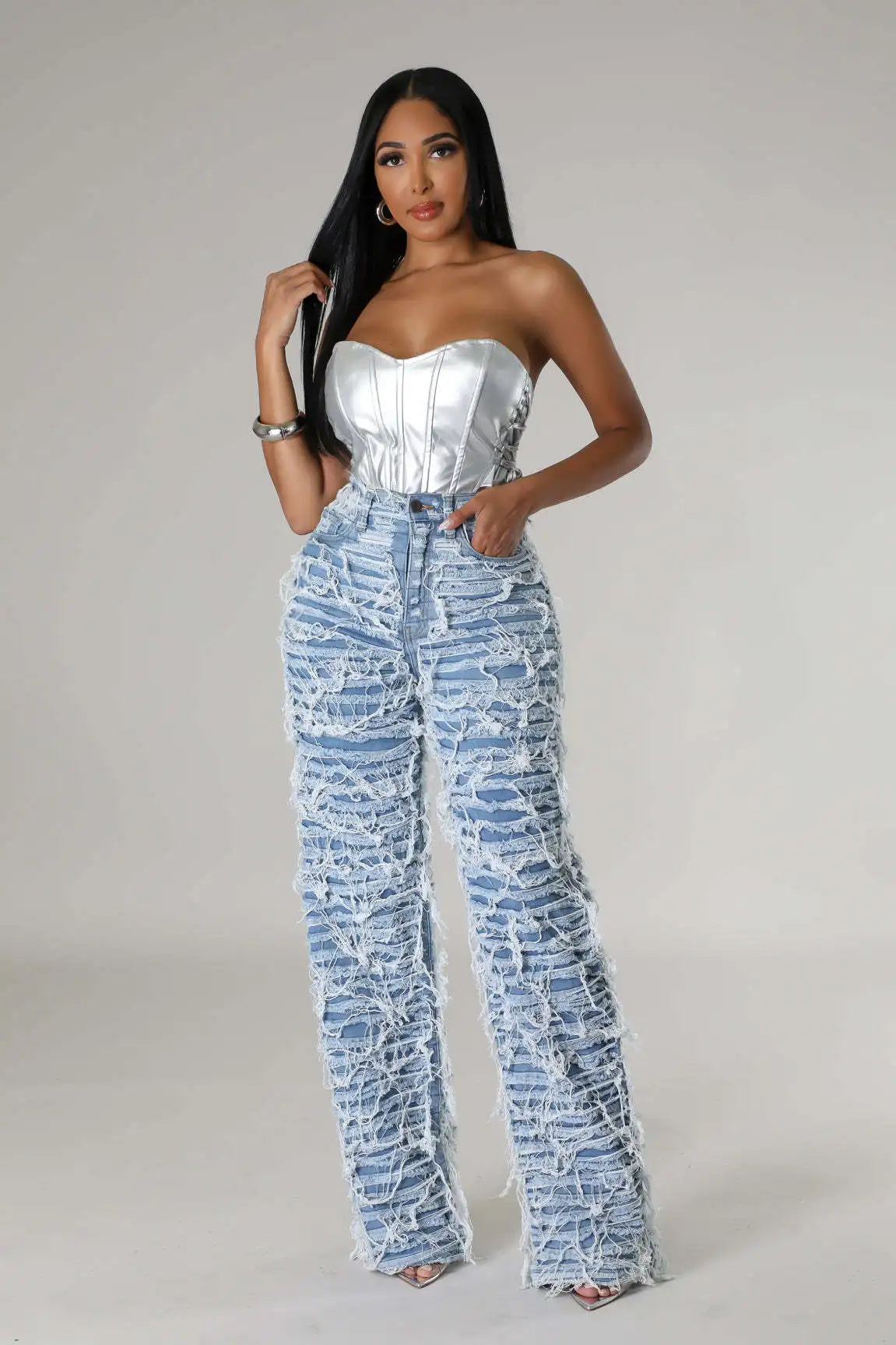 Discover the CM.YAYA Street Denim Pants for Women, featuring a chic ripped design with playful tassels, a flattering high waist with a zipper, and a straight, loose fit perfect for fall. These trousers are the ultimate party