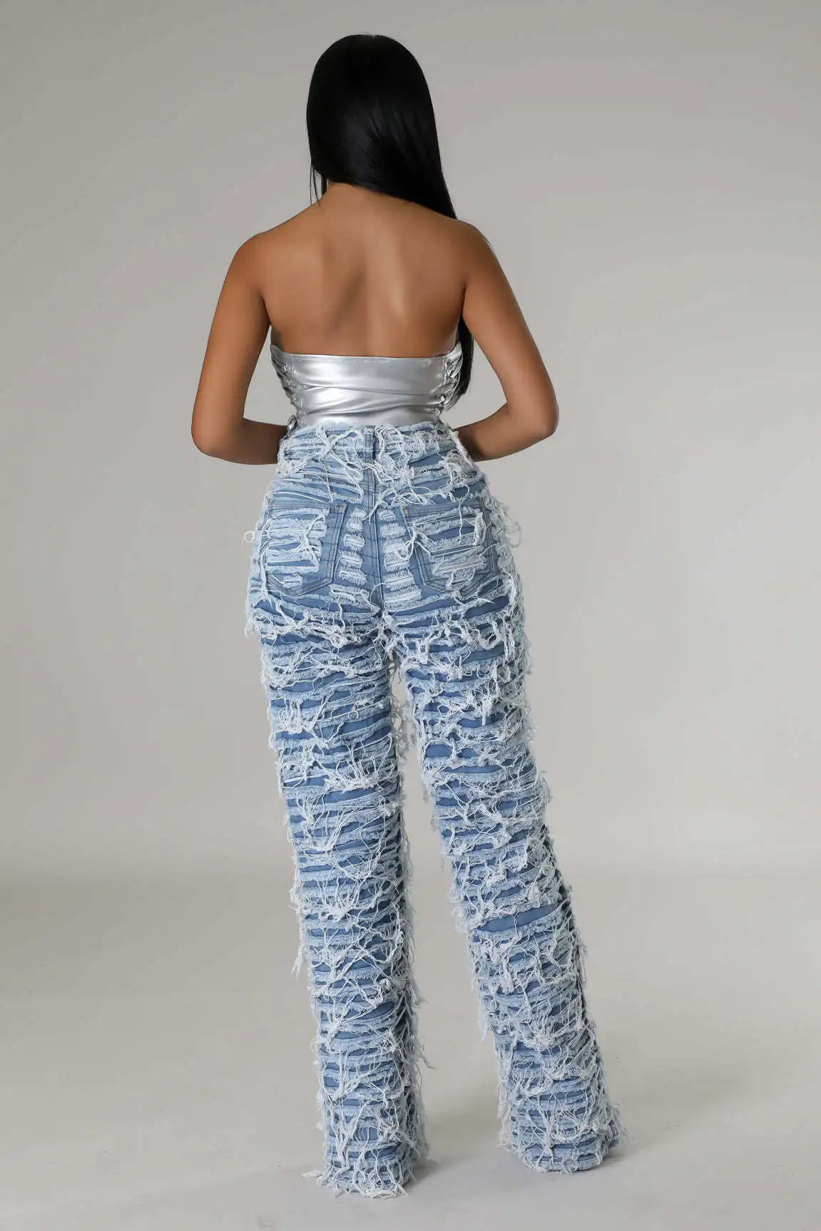 Discover the CM.YAYA Street Denim Pants for Women, featuring a chic ripped design with playful tassels, a flattering high waist with a zipper, and a straight, loose fit perfect for fall. These trousers are the ultimate party