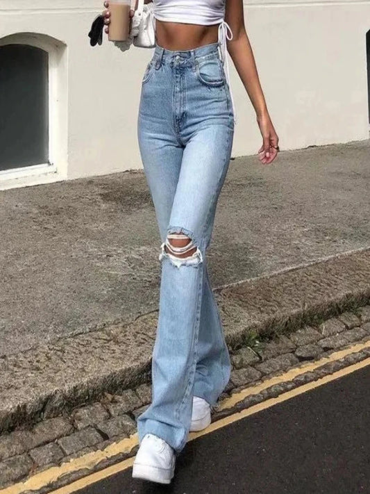 Ripped high-waist, straight-leg jeans with a flared design for the street-savvy, trendy individual who loves long denim.