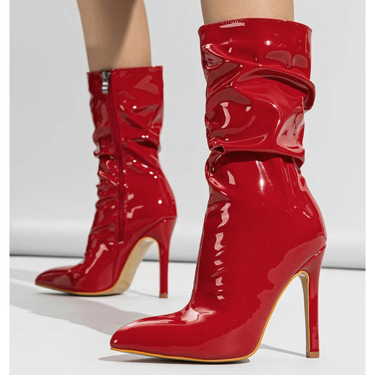 Step into the season with Aneikeh Fashion's sleek patent leather pleated ankle boots. Perfect for women who want to combine style with comfort this autumn and winter, these boots feature a chic pointed toe and slender high he