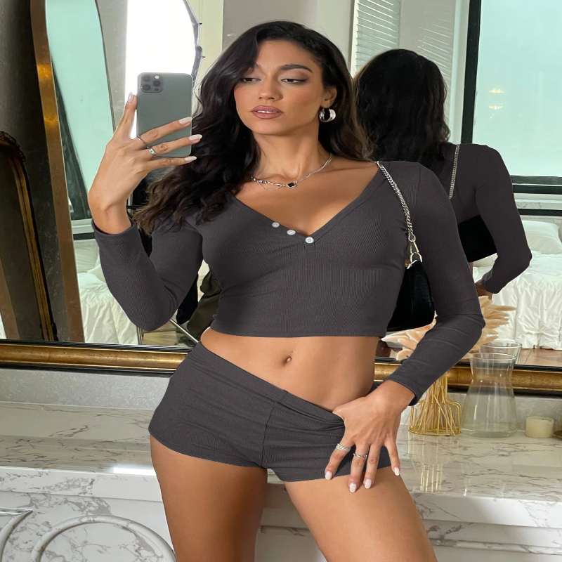 **"Women's Ribbed 2-Piece Set – Long Sleeve Top & Micro Shorts"**  
Own the night—or your day—with Tye Meshun's ribbed bodycon set. Featuring a sleek long-sleeve tee and figure-hugging micro shorts, this outfit blends c