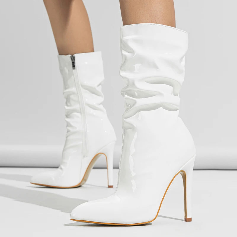 Step into the season with Aneikeh Fashion's sleek patent leather pleated ankle boots. Perfect for women who want to combine style with comfort this autumn and winter, these boots feature a chic pointed toe and slender high he