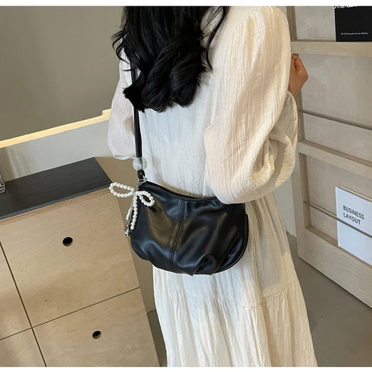 Introducing the Crossbody Clouds Bags for Women! These trendy fashion shoulder bags are perfect for stylish females seeking chic handbags and purses. Ideal for underarm carrying they combine with modern elegance to elevate an