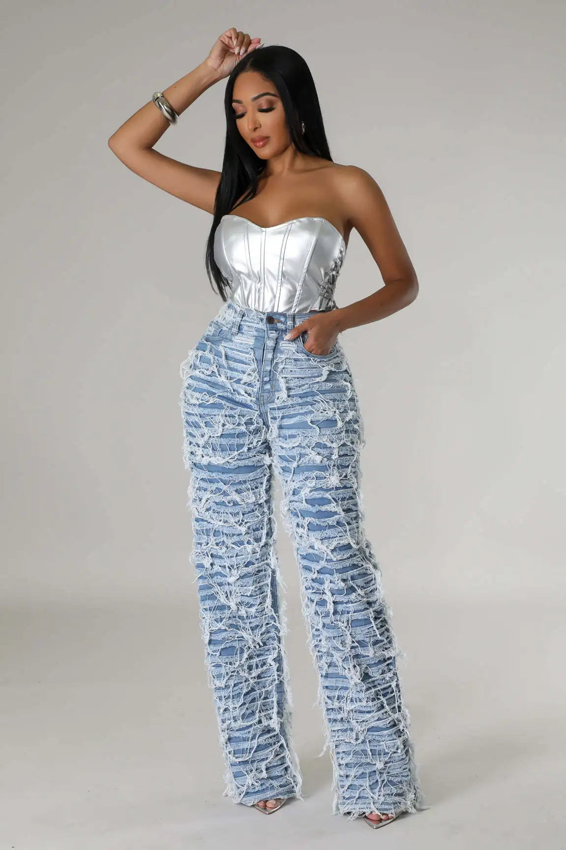 Discover the CM.YAYA Street Denim Pants for Women, featuring a chic ripped design with playful tassels, a flattering high waist with a zipper, and a straight, loose fit perfect for fall. These trousers are the ultimate party