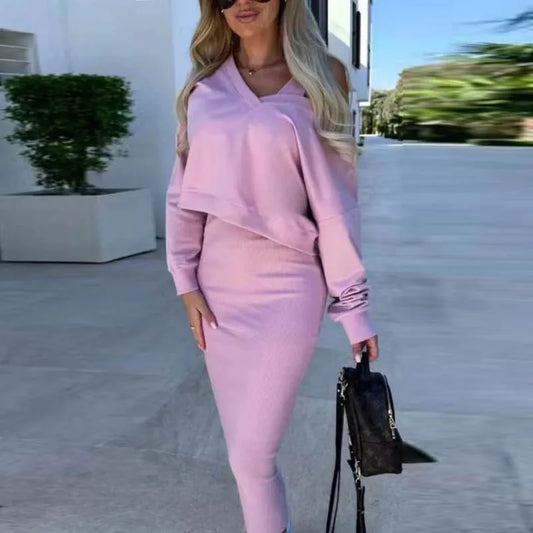 **"Women's Autumn Two-Piece Dress Set"**  
Hand-selected for Tye Meshun's Boutique, this V-neck, long-sleeve sweatshirt pairs perfectly with a coordinating long skirt. A chic solid color for comfort and sophistication.