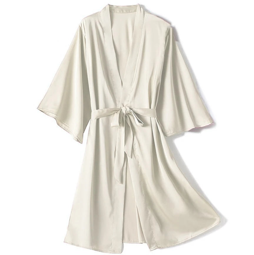 **"Satin Kimono Bathrobe Gown"**  
Embrace your sensual side with Tye Meshun’s satin kimono bathrobe. Silky, sleek, and irresistibly alluring, it drapes perfectly over your favorite lingerie, transforming every evening into